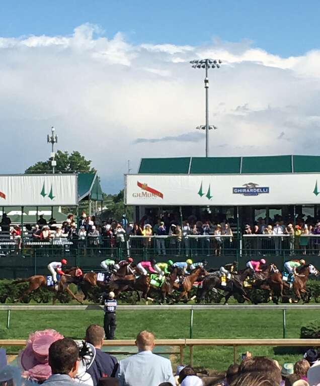 Three year old Thoroughbreds race a mile and a quarter to the finish at Churchill Downs.