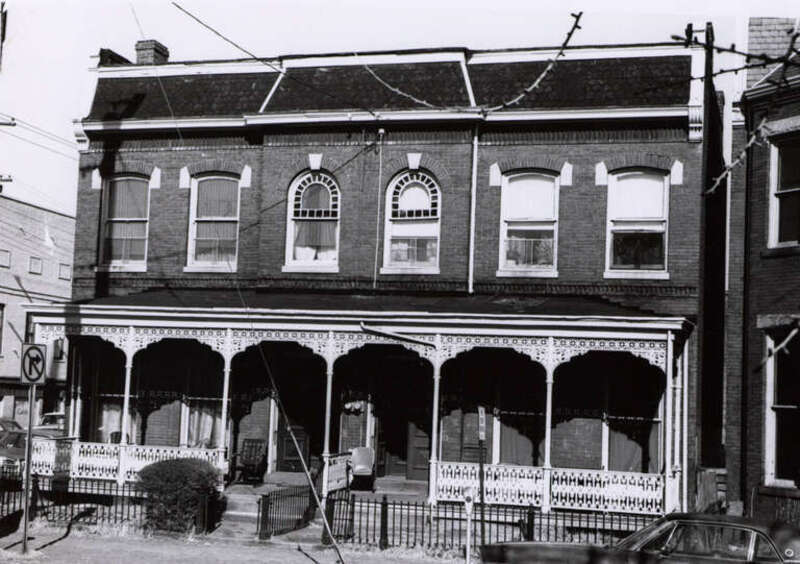 Address/Title: 100 - 102 East Clay Street
Photographer: Zehmer, John G. (John Granderson), 1942-
Original Description (from Book): This is a very late Queen Anne house with cast iron porches. The cast iron was manufactured by the Tredegar Iron Works