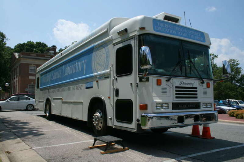 UNC's Traveling Science Laboratory Blue Bird bus parked at the Morehead Planetarium and Science Center in Chapel Hill, North Carolina. This bus is &quot;Discovery,&quot; a member of the DESTINY fleet. These busses are part of a science education program which