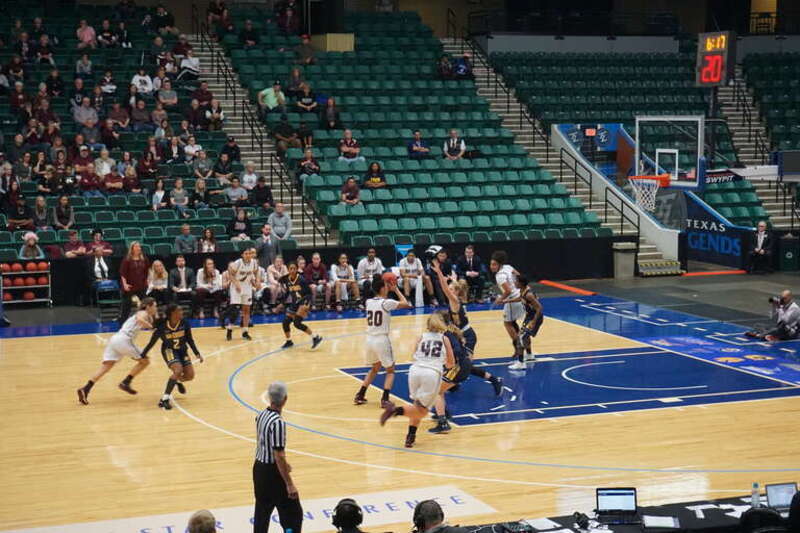 In-game action during the Texas A&amp;amp;M–Commerce Lions vs. West Texas A&amp;amp;M Buffaloes women's basketball game at the 2018 Lone Star Conference Women's Basketball Championship at the Dr Pepper Arena in Frisco, Texas (United States). West Texas