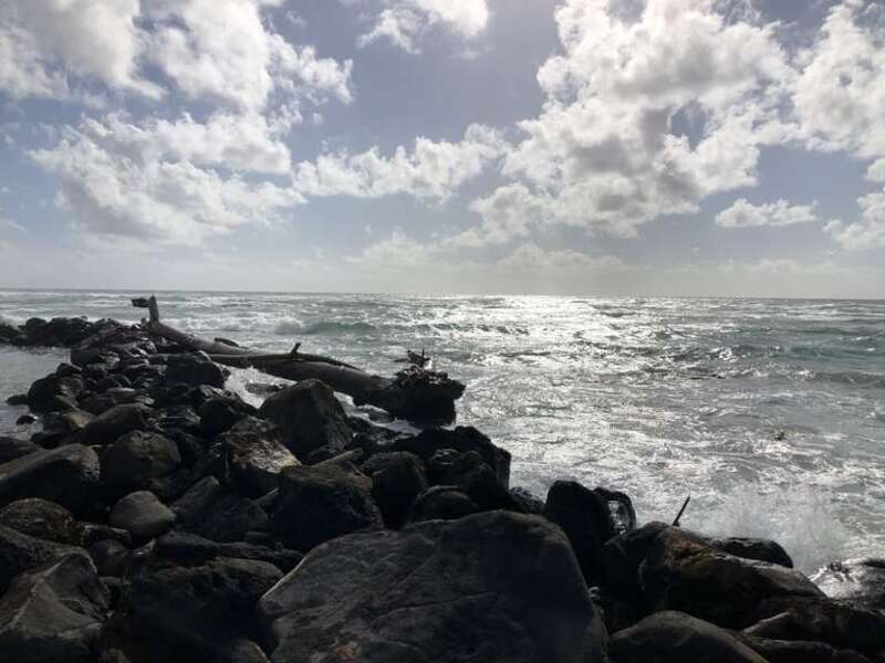View east from the beach within Lydgate Beach Park in Kauai, Hawaii