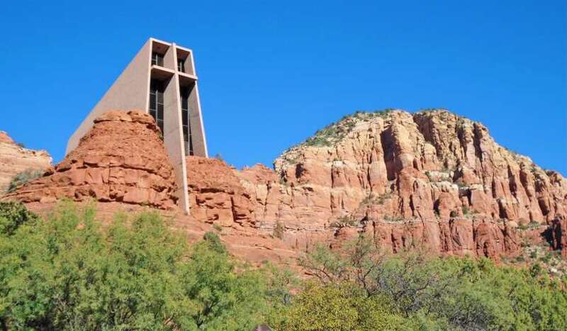 The Chapel of the Holy Cross is a Roman Catholic chapel built from 1954 to 1956 into the red rock buttes of Sedona, Arizona, within the Coconino National Forest. It was inspired and commissioned by local rancher and sculptor Marguerite Brunswig
