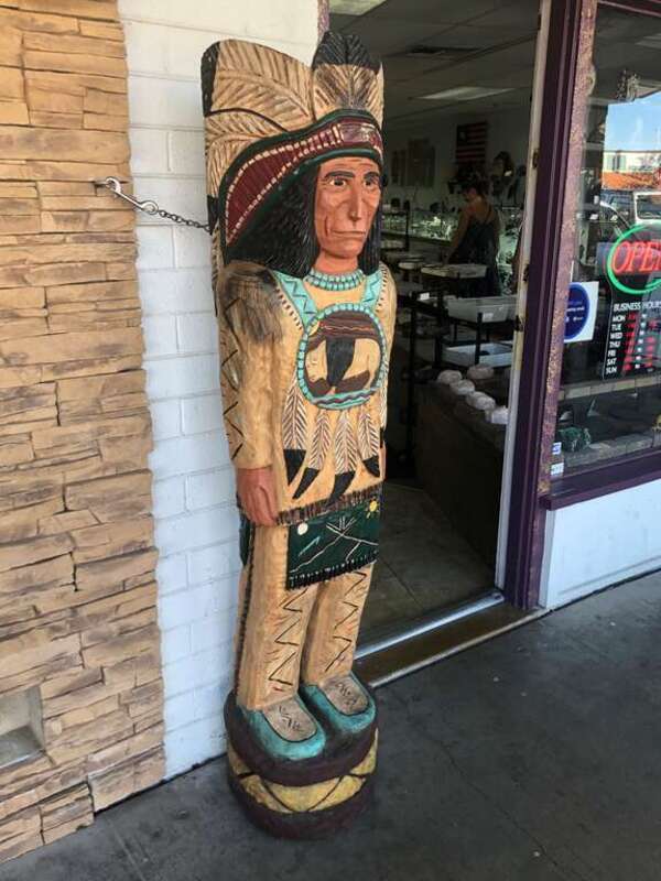 A cigar store Indian at 7805 East 5th Avenue in Old Town Scottsdale, Arizona, between  North Marshall Way and North Craftsman Court.