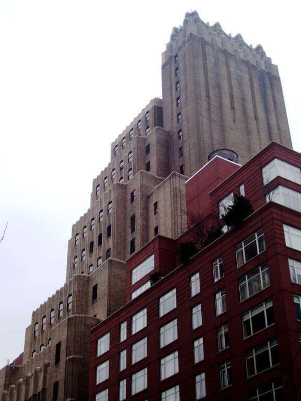 The Verizon telephone building at 215 West 17th Street, between Seventh and Eighth Avenue, in the Chelsea neighborhood of Manhattan, New York City, as seen from the east.  The building in the foreground is the Vesta 17 condominium building at 201