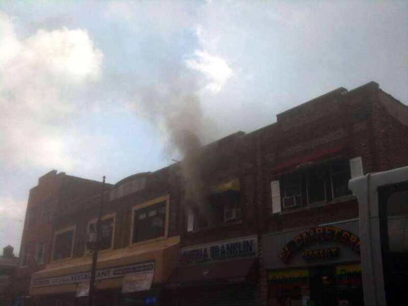 A fire at 4114 Bergenline Avenue in Union City, New Jersey on August 15, 2012. The fire started a short time before 12:45pm, when police officers first arrived on the scene, which was when I was passing by in a commuter van, and first saw what was