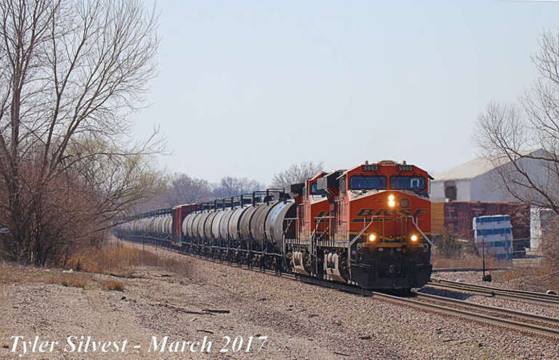 Burlington Northern Santa Fe 5903(ES44AC) and 600(AC44C4M) Lead a Northbound Manifest on the BNSF Fort Scott Sub just before passing the 151st Terrace Crossing West of Keeler Street in Olathe, Kansas.
Video Link: 
Photo Taken: 3-19-17 at 12:41