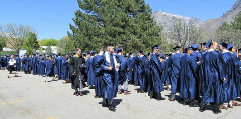 BYU graduates waiting to march to the Marriott Center for Commencement.