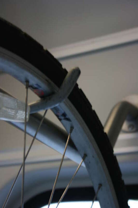 Looks like the hook will accommodate fairly wide wheels.