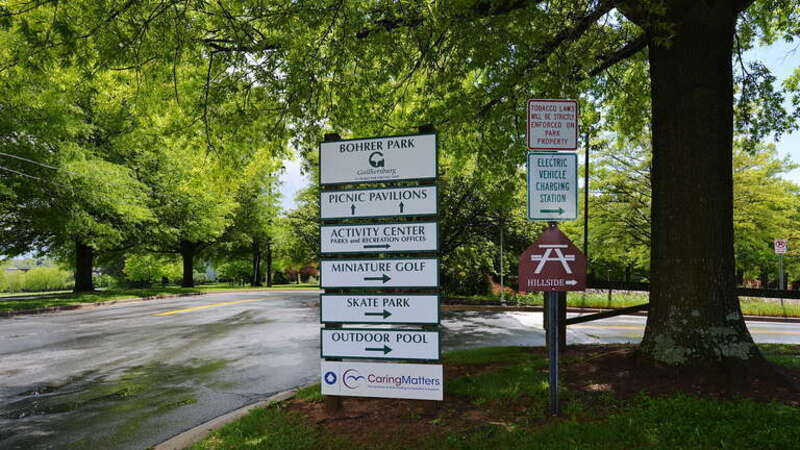 Signs at Bohrer Park showing where to go for different activities including Miniature Golf, the Skate Park, the Outdoor Pool, the activity Center, and Picnic Pavilions. This park is run by the city of Gaithersburg, Maryland. 506 South Frederick