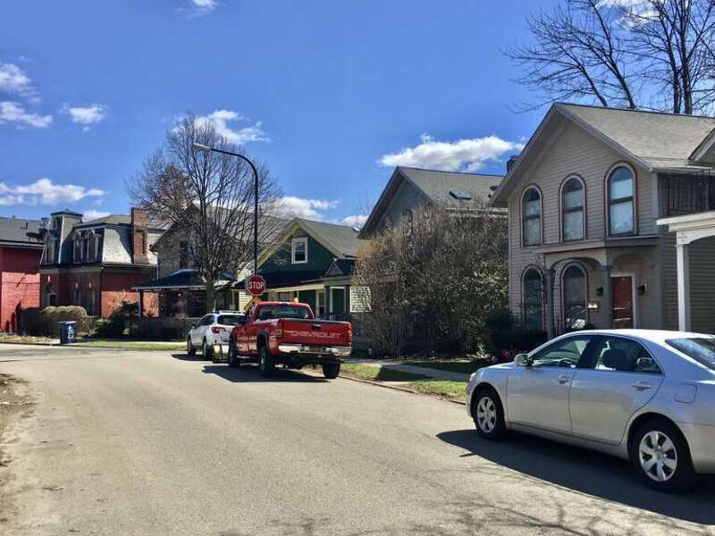 As seen in April 2020: looking eastward along Cottage Street in Buffalo, New York, at its far end, near the corner of College Street, it's obvious from whence its name came.