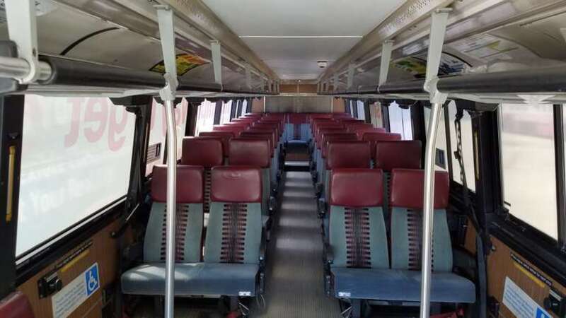Interior view, from the front towards the rear, of Charleston (South Carolina) Regional Transportation Authority bus 1411, a 1994 Flxible Metro, ex-Golden Gate Transit 1411, in 2018
