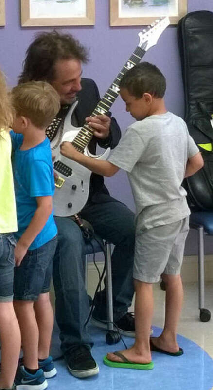 Craig bringing music therapy to Renown Children’s Hospital in Reno, Nevada in 2016 (Dara Crockett)