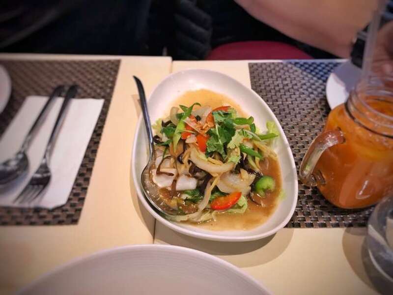 CHILEAN SEA BASS with SUKI SAUCE (Spicy) Steamed sea bass topped with our special spicy chili sauce. Served on top of steamed vegetables at Lotus of Siam in Las Vegas, Nevada