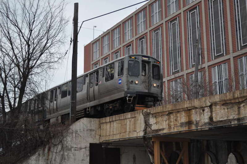 CTA Purple Line train crossing Davis Street just south of the Davis Street station in Evanston, Illinois.