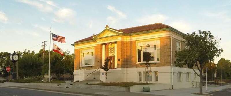 Carnegie Library, 557 Lincoln St. Roseville, CA. Photo captured at sunrise on GoPro3 HD camera shooting time-lapse images every 10 seconds. This photo was selected for the natural cloud formations, early morning sun illuminating the historic building