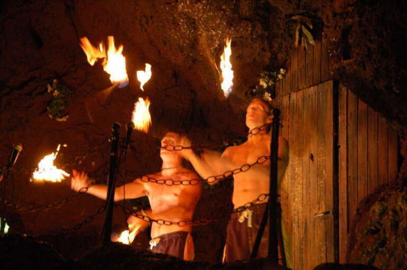 Juggling flaming torches