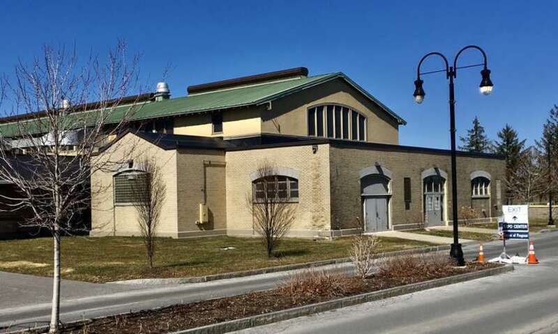 As seen in March 2021. Although the main façade of the Cattle Building eschews the High Neoclassical style employed by the Buffalo firm of Green &amp;amp; Wicks on the other buildings they designed for the New York State Fairgrounds in favor of an Arts