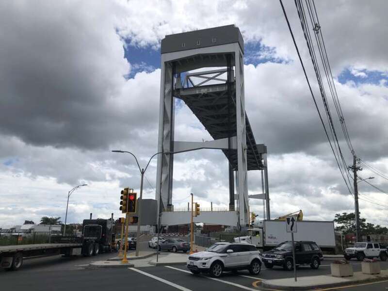 Traffic waiting for the Chelsea Street Bridge in its raised position, which allows ships to pass underneath.