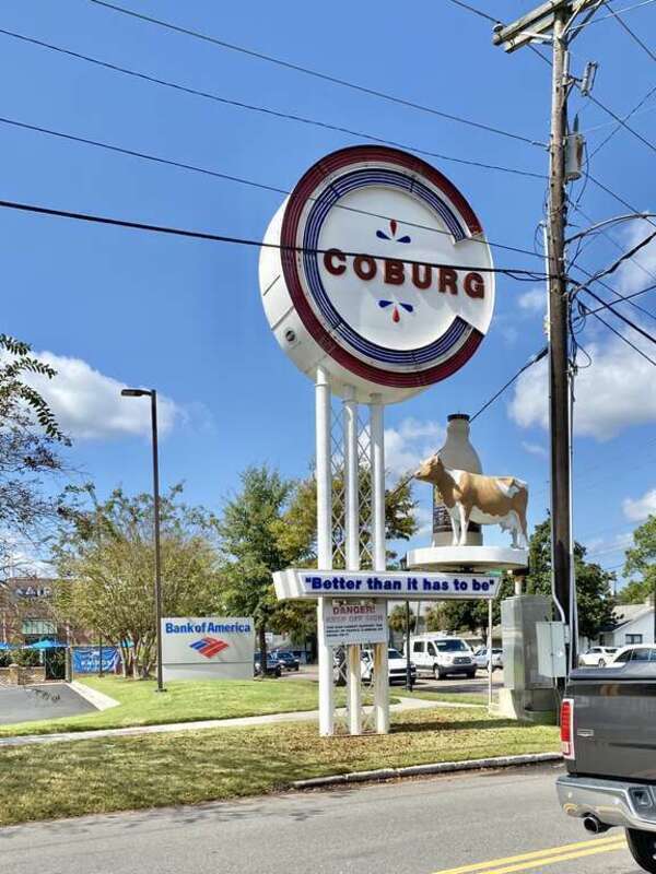 The third iteration of the sign for the nearby Coburg Dairy that has stood along Savannah Highway (US Highway 17) at this spot since the late 1920s, this neon behemoth with its three-dimensional faux cow has been a local landmark since 1959.