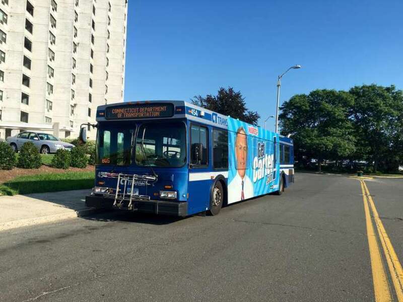 Displaying a rare sign, 454 waits to start a B1 to New Haven Green.