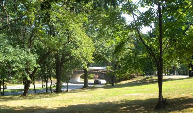 Looking southeast as Davis Avenue passes under Woodland Avenue in West Hudson Park on a sunny early afternoon.