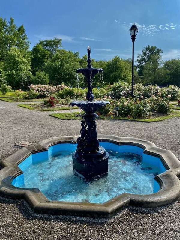 The pleasant fountain at the center of the Rose Garden at Delaware Park, Buffalo, New York, as seen in June 2021.