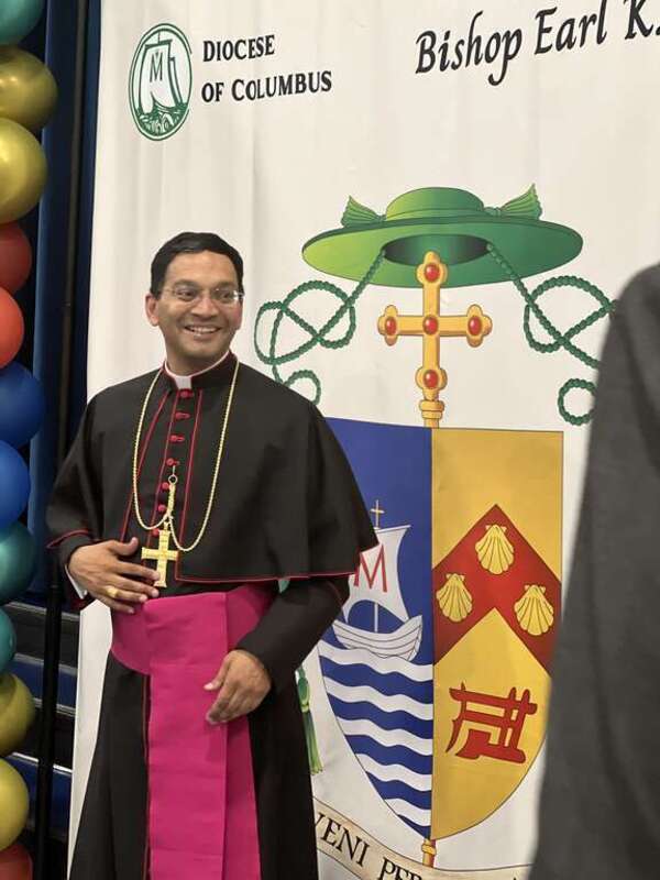 Fernandes greeting people following his episcopal ordination in 2022