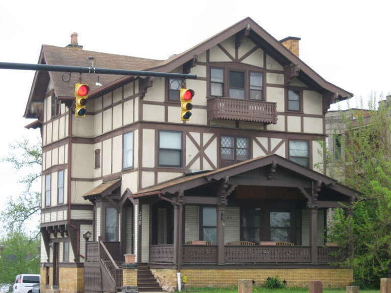 Front and eastern side of the Edward P. Werner House, located at 258 W. Market Street (State Route 18) in Akron, Ohio, United States.  Built in 1905, it is listed on the National Register of Historic Places.