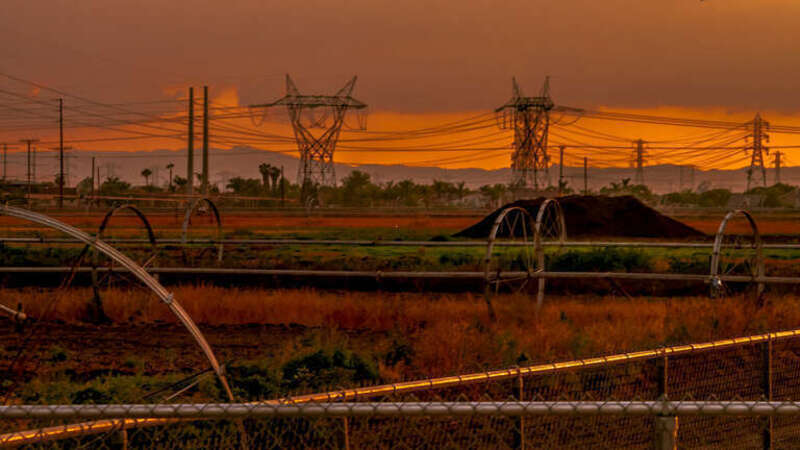 Electrical lines farmland and a field behind Colony High School. Ontario California