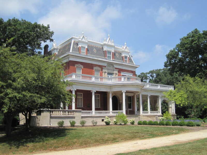 Ellwood Mansion in DeKalb (1879, remodeled 1910). Isaac Ellwood headed west from New York in 1849 during the California Gold Rush. He was somewhat successful, and returned to DeKalb to set up a hardware store with his earnings. The store was very