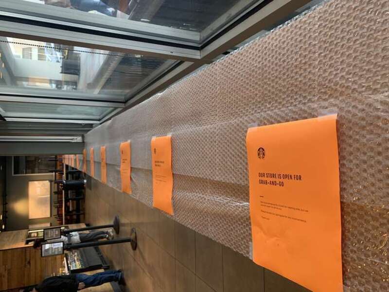 Empty tables at a Starbucks, at Westlake Center in Daly City, California, United States.