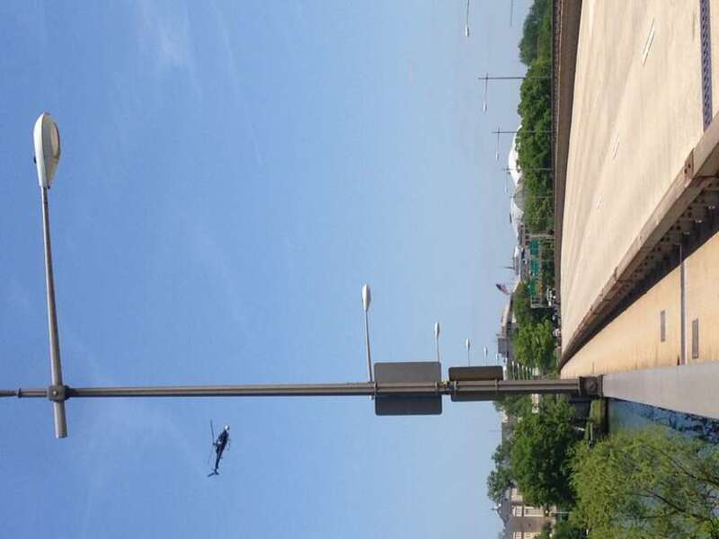 They were filming aerial shots for &quot;Captain America: The Winter Soldier&quot; on the Theodore Roosevelt Bridge today. I managed to get stuck on the bridge at the right time to take these pics and videos of the circling helicopter. You can see the camera