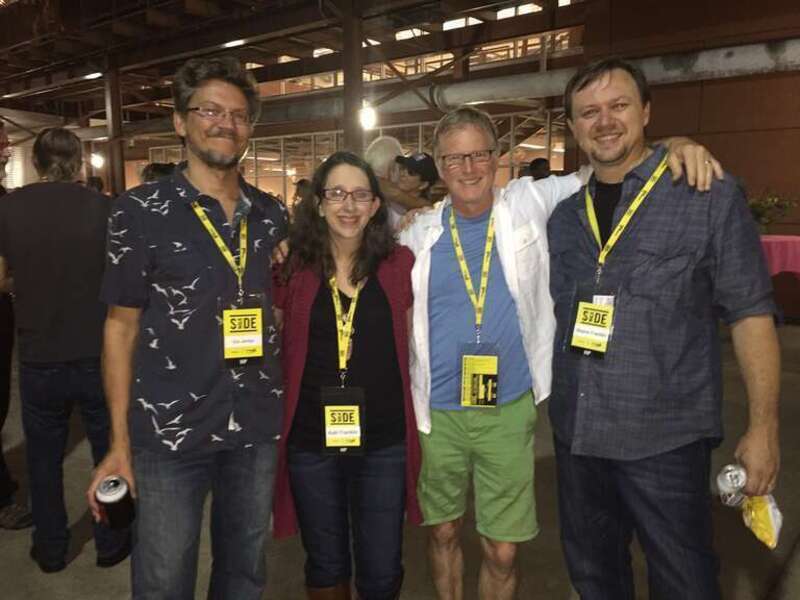 The three festival founders pose with original Board of Directors president Alan Hunter at the 2015 festival. From left to right: Erik Jambor, Kelli Franklin, Alan Hunter, Wayne Franklin.