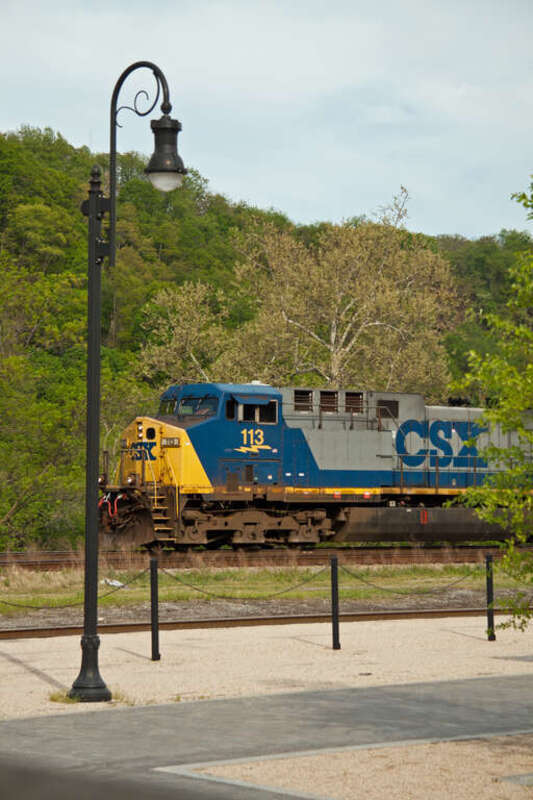 While having an excellent meal on the outdoor deck at the Depot Grille in Lynchburg, I didn't  even need to stand up to shoot this CSX train.