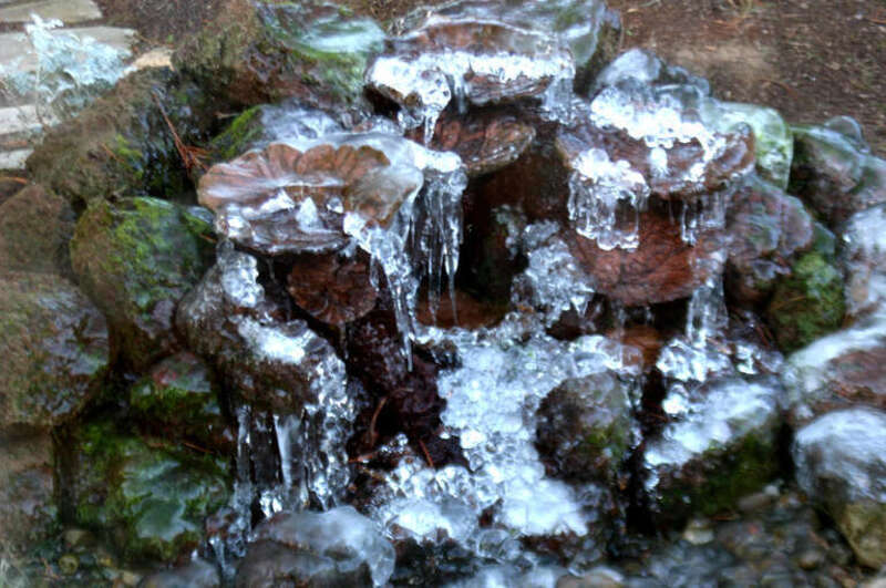 500px provided description: frozen water fountain in the winter [#trees ,#green ,#landscapes ,#waterfall ,#waterscape ,#waterfalls]