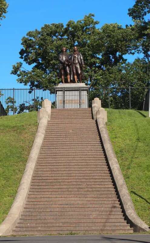 Goethe-Schiller Monument in Schiller Park, Syracuse, New York. The monument was dedicated on October 15, 1911. The statue is an electrotyped copper copy of Ernst Rietschel's bronze casting, which is incorporated in the original 1857 Goethe-Schiller