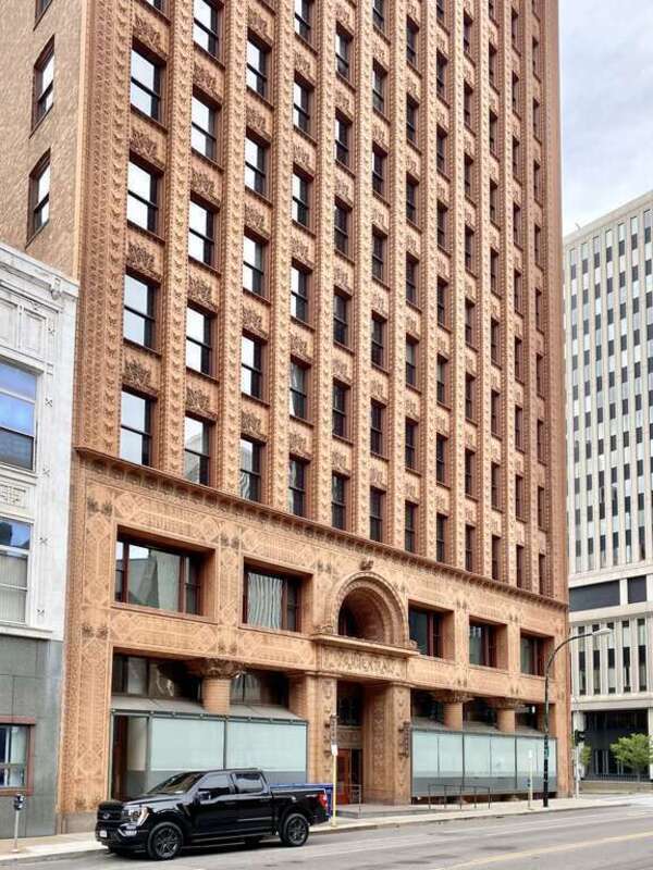 [Built in 1895-1896, this Chicago School-style thirteen-story skyscraper was designed by Louis Sullivan and Dankmar Adler for the Guaranty Construction Company.  It was initially commissioned by Hascal L. Taylor, whom approached Dankmar Adler to