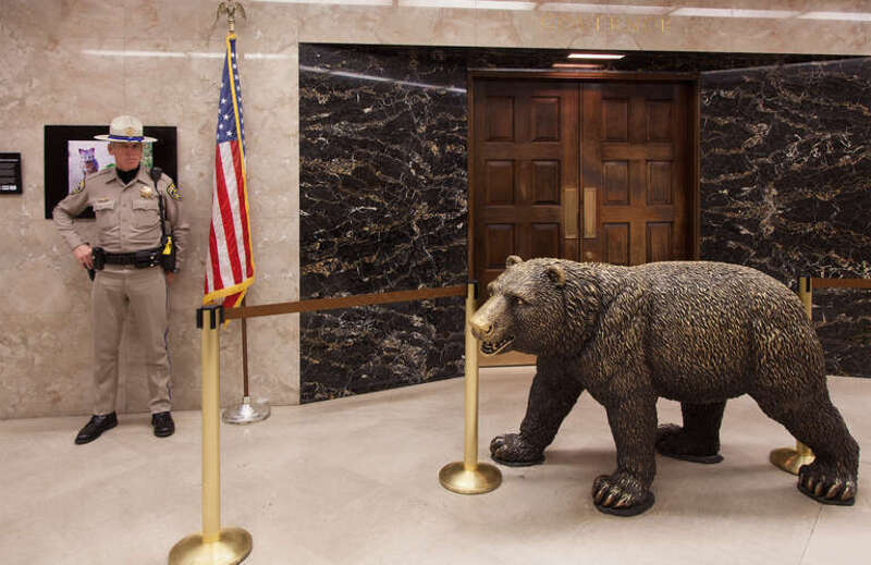 The bronze bear in front of the Office of the Governor of California was dubbed &quot;Bacteria Bear&quot; by California Highway Patrol Officers who guard the State Capitol; schoolchildren can't resist touching the statue. The bear belongs former Governor