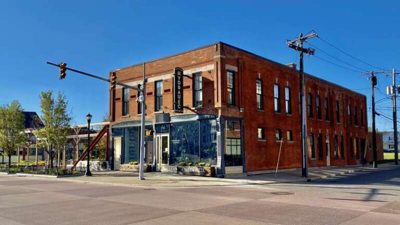 Hydraulic Hearth, 716 Swan Street at Emslie Street, Buffalo, New York, May 2021. Built in 1885, this is a good representative example of the vernacular commercial architecture of its day, with a mostly utilitarian exterior accentuated by decorative