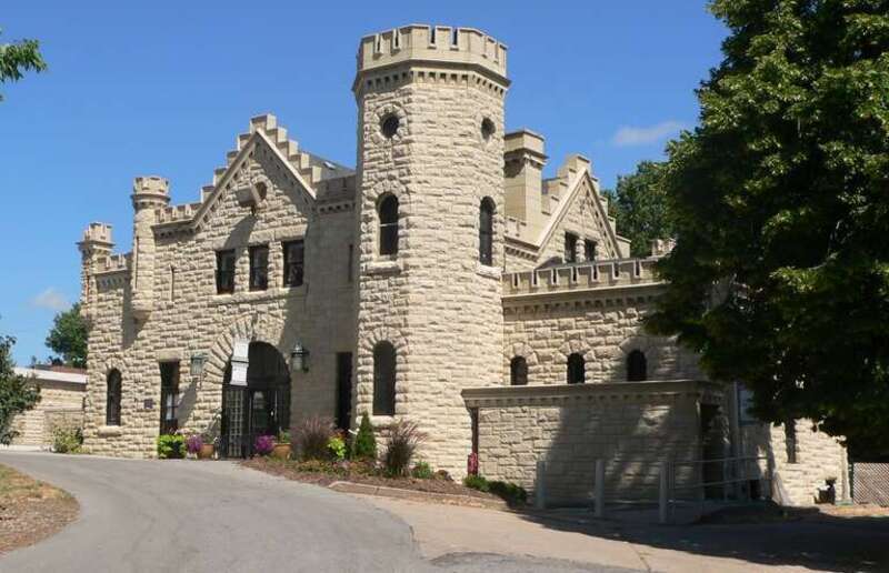 Carriage house northeast of Joslyn Castle, located at 3902 Davenport Street in Omaha, Nebraska.  View is from the southeast; the main house is out of frame to the left.