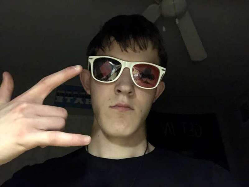 K.mc. wearing his signature sunglasses.