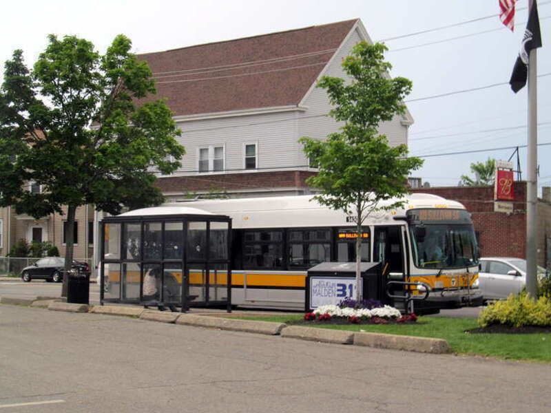 A #109 bus lays over at Linden Square in Malden, near the Revere border