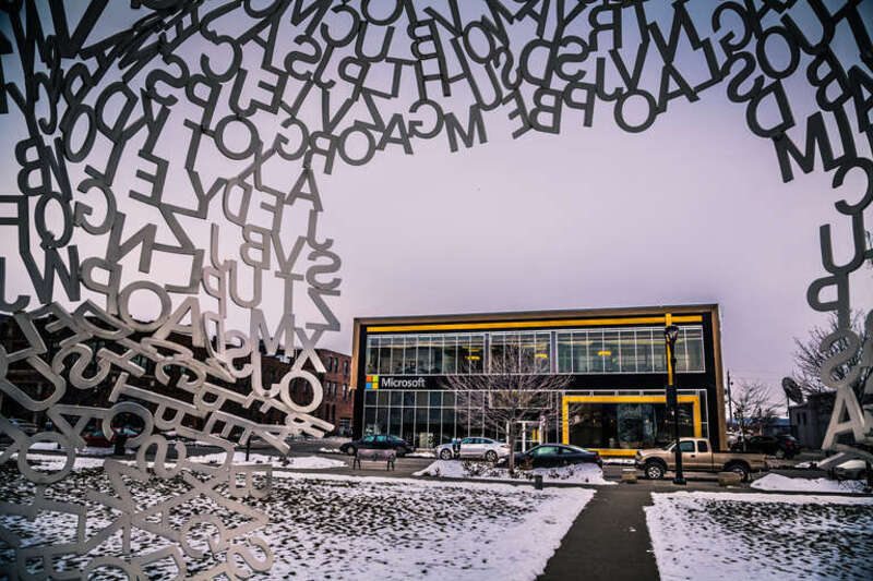 The Microsoft Store and Locust Street as seen from inside Jaume Plensa's &quot;Nomade&quot; at the Pappajohn Sculpture Park in Des Moines, Iowa.