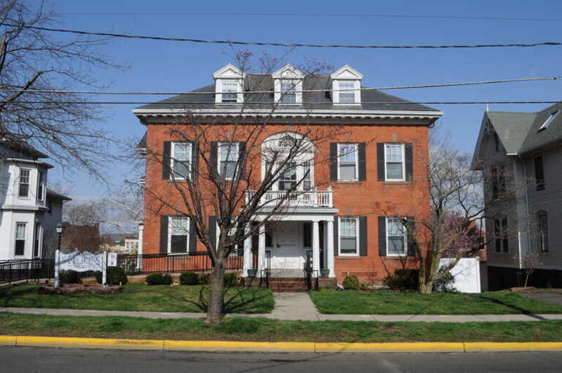 144 Broad Street, Middletown, Connecticut. Historic rectory of the Church of the Holy Trinity (Episcopal), also known as the Bishop Acheson House, now elderly residential apartments run by St. Luke's. The building is a contributing property of the