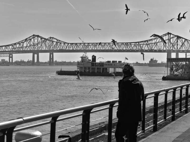 500px provided description: Mississippi River [#landscape ,#river ,#bridge ,#man ,#monochrome ,#new orleans ,#mississippi ,#louisiana ,#nola]