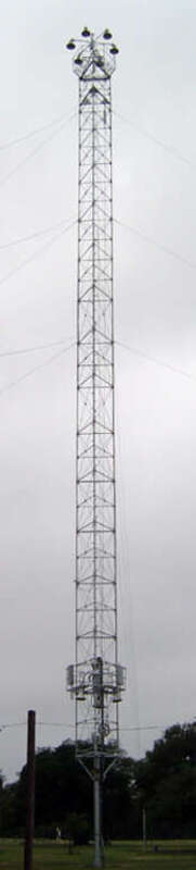 A moonlight tower located in Zilker Park, Austin, Texas, United States. This tower is a replica built in 1967 to replace one of the original 1895 towers that had fallen. This tower forms the &quot;trunk&quot; of the Zilker Tree, a 155 ft tall tree of lights