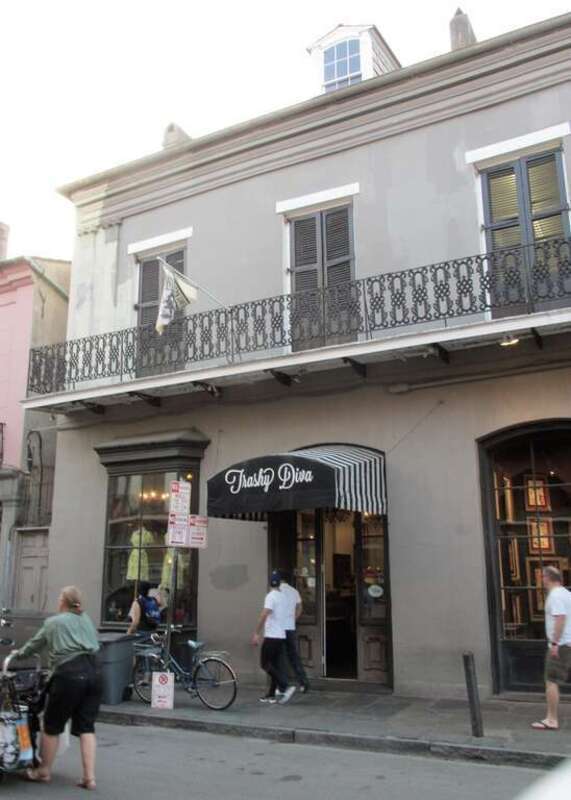 This attractive building on Toulouse Street is next to the Two Lions building.