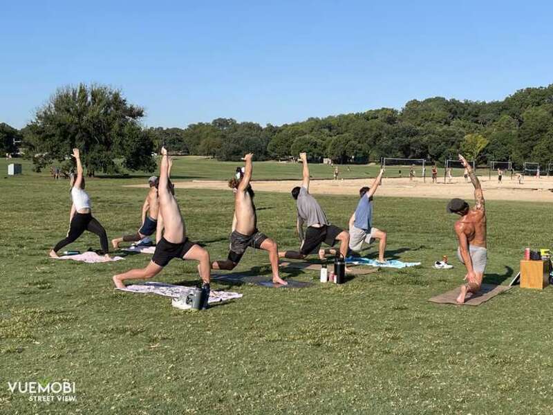 Morning yoga group exercise at Zilker Park, near downtown Austin.