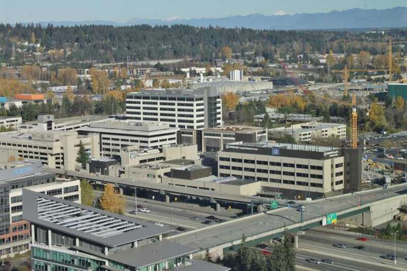 An overhead view of the Overlake Hospital Medical Center campus in Bellevue, Washington, as seen from the west atop The Bravern office complex.