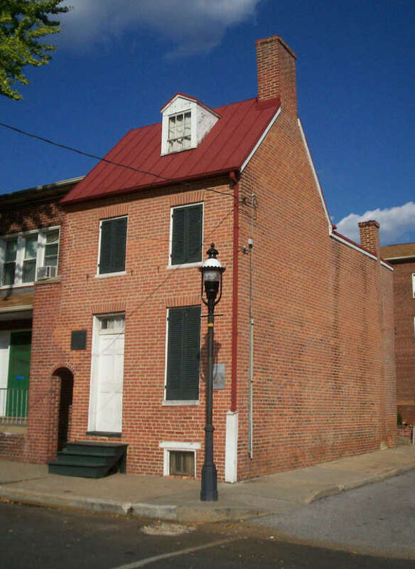 Exterior of the Edgar Allan Poe House and Museum, located at 203 N. Amity St. in Baltimore, Maryland (USA). Poe's bedroom is believed to have been on the third floor.
